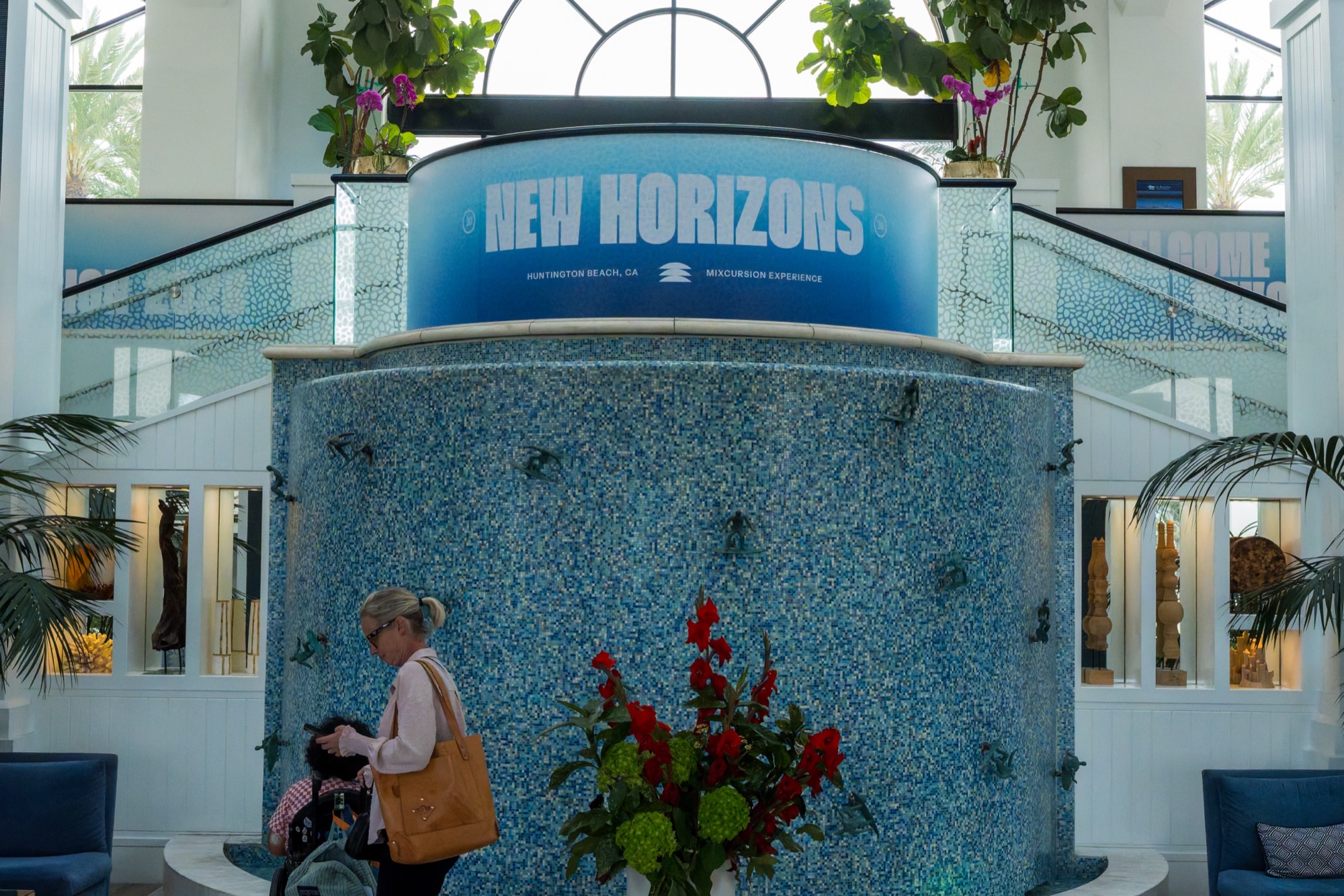 Mixcursion 2026 lobby fountain with NEW HORIZONS banner
